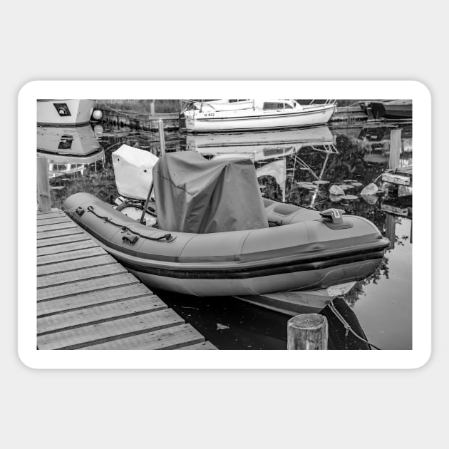 Inflatable boat moored on the River Ant, Norfolk Sticker by yackers1